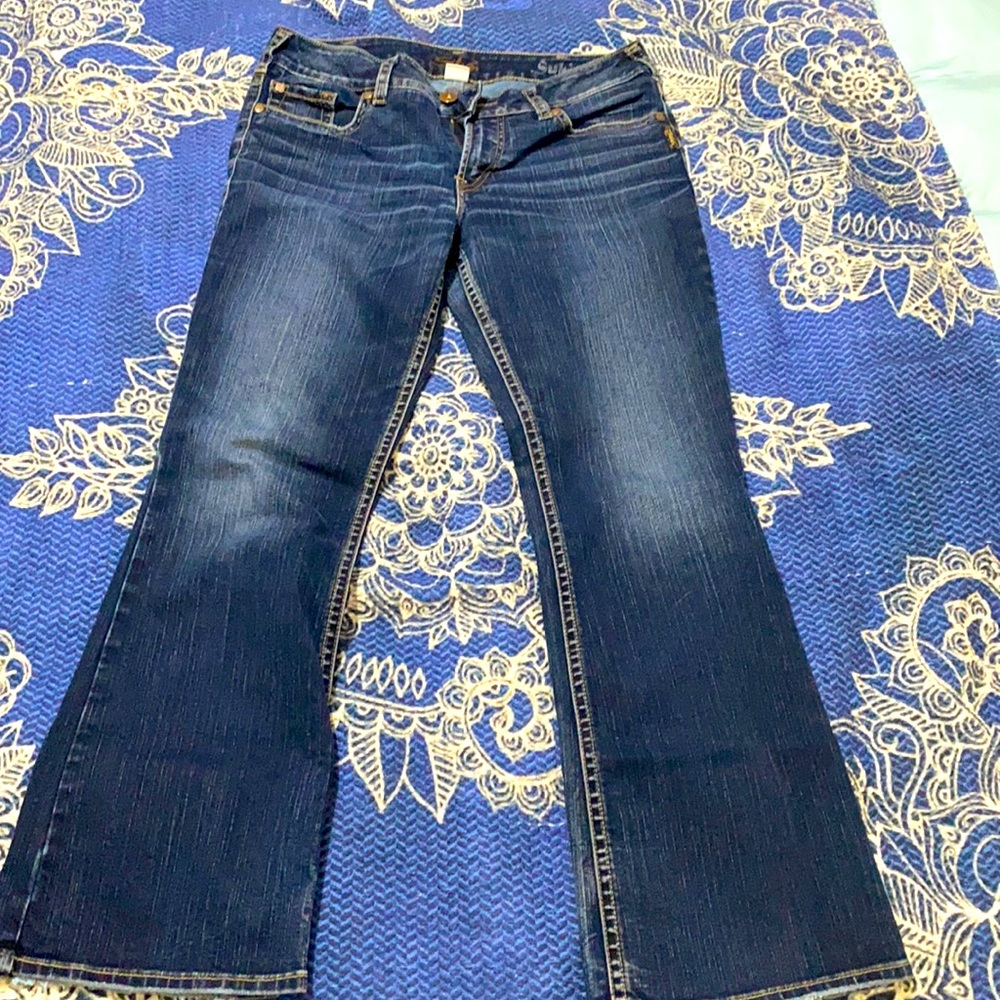 Sliver Suki dark wash bootcut jeans.